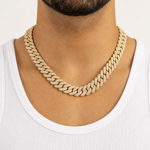 Model wearing gold 12mm triple-row moissanite Cuban link necklace