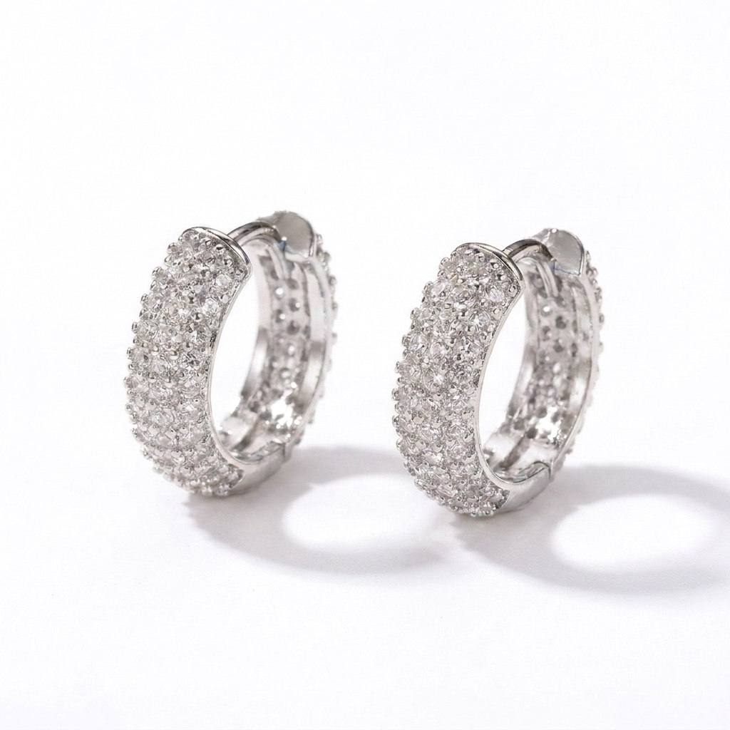 White gold iced out triple-row hoop earrings with CZ stones