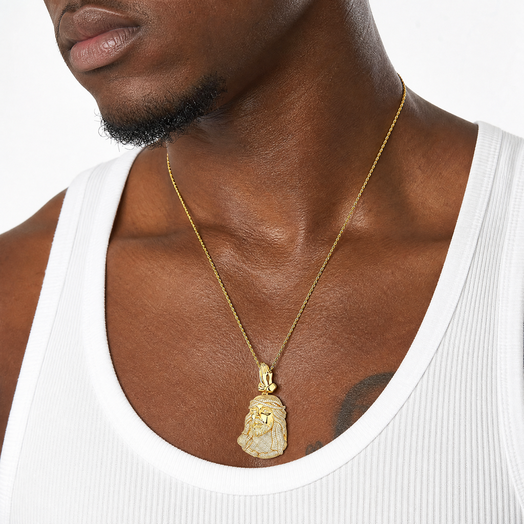 Iced out praying Jesus pendant worn with a 24 inch rope chain
