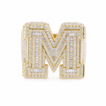 Gold iced letter M ring on white background