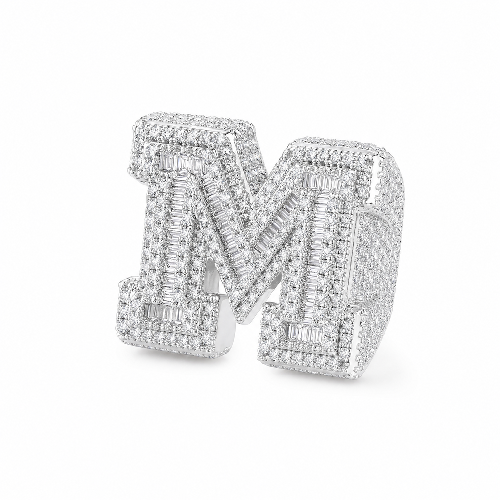 White gold iced letter M ring on white background